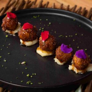 Albondigas de Chicharrón en Miel de Chile Amazónico